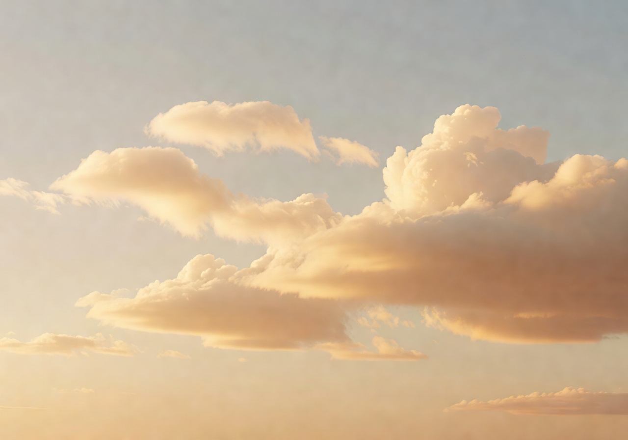 Soft clouds with warm sunlight creating a minimal premium sky look